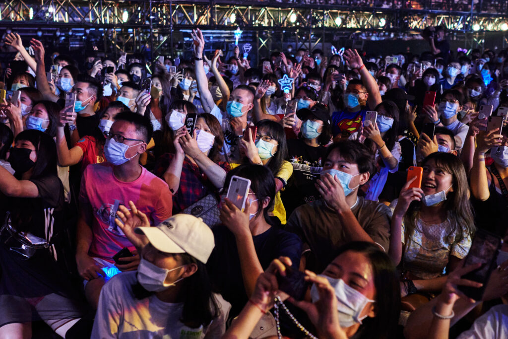 Concert attendees with face mask.